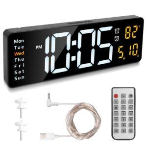 Digital alarm clock with remote and USB cable.