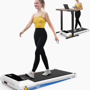 Woman walking on treadmill desk.