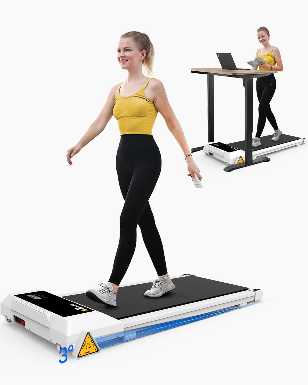 Woman walking on treadmill desk.