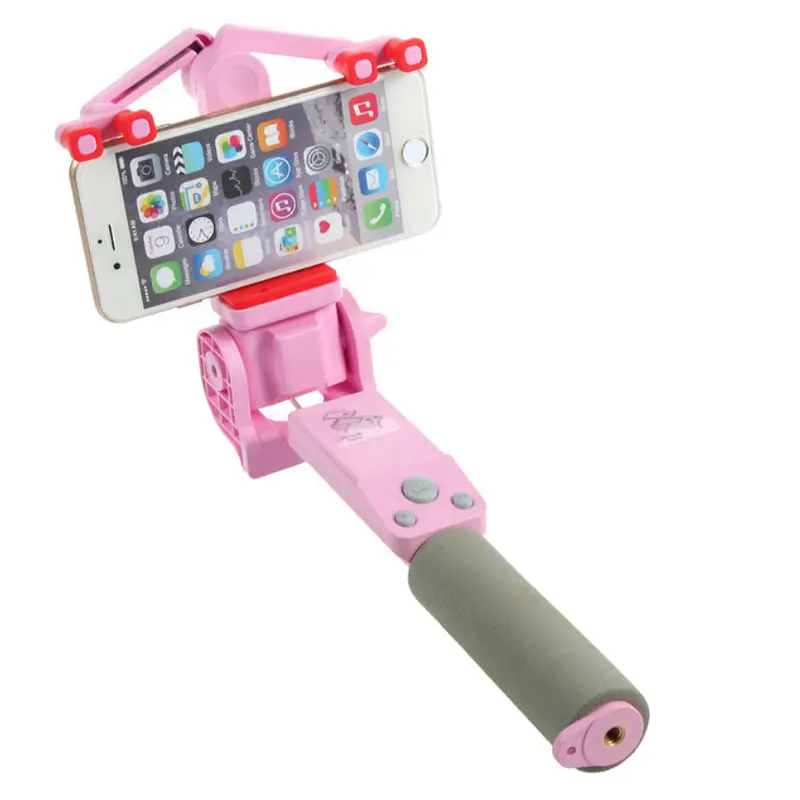 Pink selfie stick holding a smartphone