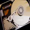 Open hard drive showing internal components