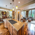 Modern kitchen with granite countertops and hardwood floors