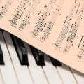 Sheet music on a piano keyboard